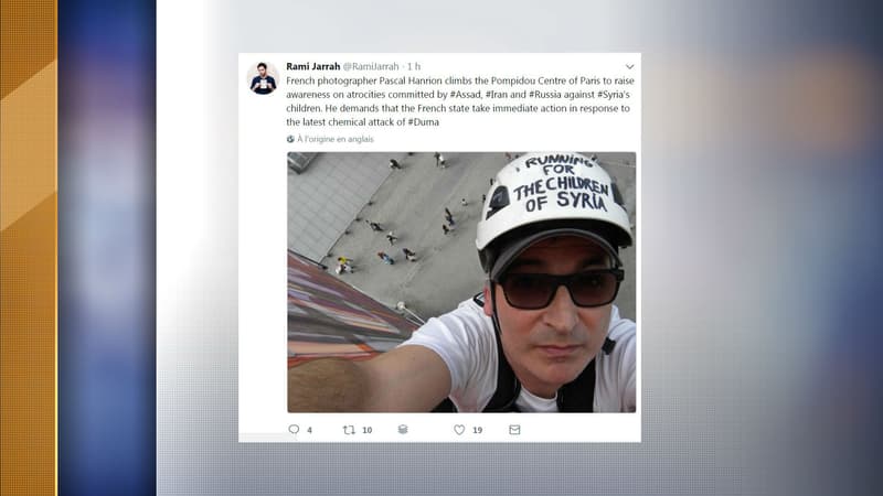 Un photographe français s'est suspendu à la façade du centre Pompidou dimanche.