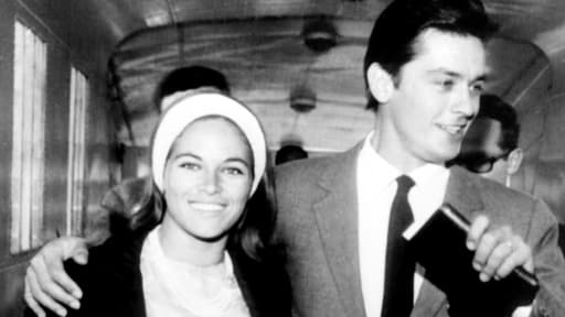 Nathalie and Alain Delon embark on France the day after their wedding, in Le Havre on August 14, 1964