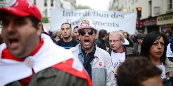 Des syndicalistes lors du défilé du 1er mai 2013 à Paris.