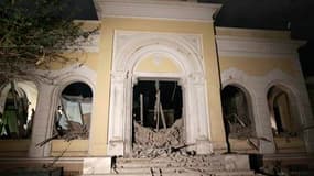 Le bâtiment de la Haute commission libyenne pour l'enfance, à Tripoli, qui aurait été bombardé par l'Otan selon les autorités libyennes. L'Otan a tiré mardi des missiles contre plusieurs objectifs dans le secteur de la capitale libyenne, au nombre desquel