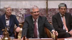 Le président de l'Assemblée nationale Claude Bartolone, tout sourire après l'adoption de la loi sur le mariage pour tous.