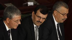 Ennahda, qui compte le plus grande nombre de députés à l'Assemblée nationale, a proposé le nom du ministre de l'Intérieur sortant, Ali Larayedh (au centre), pour diriger le futur gouvernement tunisien. /Photo prise le 14 janvier 2013/REUTERS/Zoubeir Souis