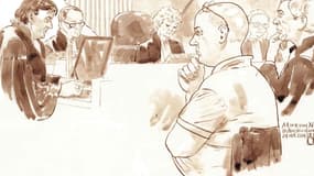 Mark van Nierop (à droite), le médecin accusé d'avoir mutilé plusieurs patients dans la Nièvre, ici dans un tribunal d'Amsterdam le 24 octobre 2014. 