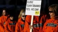 Des protestants lors d'une manifestation d'Amnesty International pour la fermeture du centre de détention de Guantanamo.