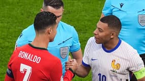 Cristiano Ronaldo et Kylian Mbappé lors de France-Portugal à l'Euro 2024.