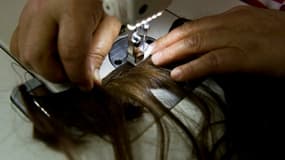 Certaines perruques destinées aux femmes atteintes de cancer seront mieux voire intégralement remboursées par la Sécu à partir de mardi, photo du 5 février 2014