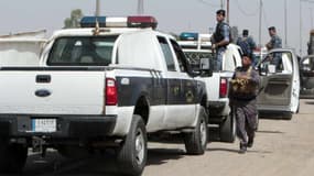 Les forces irakiennes arrivent sur les lieux d'un attentat-suicide à Taji, au nord de Bagdad, le 15 mai 2016. (Photo d'illustration) 