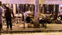 Des victimes gisent sur le sol d'un café parisien visé lors des attentats à Paris et aux abords du Stade de France, vendredi 13 novembre.
