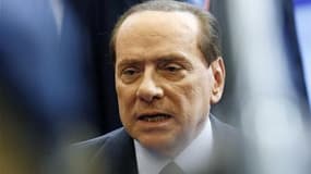 L'avenir politique de Silvio Berlusconi peut se jouer ce mardi au parlement à la faveur d'un vote décisif sur les finances publiques sur lequel sa majorité pourrait se disloquer. /Photo prise le 23 octobre 2011/REUTERS/Sebastien Pirlet