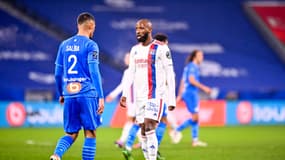 William Saliba et Moussa Dembélé lors de OL-OM en 2022