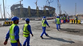 Des travailleurs sur un chantier de la Coupe du monde 2022 au Qatar, à Doha le 20 décembre 2019