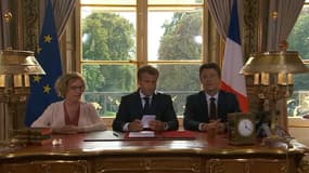 Emmanuel Macron aux côtés de Muriel Pénicaud et Benjamin Griveaux. 