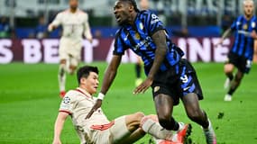 Marcus Thuram taclé par Kim Min-Jae lors du quart de finale retour de Ligue des champions entre l'Inter et le Bayern, le 16 avril 2025.