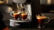 Deux cafés servis dans des tasses par une machine (photo d'illustration).