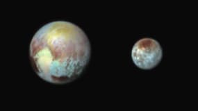 Une des images de Pluton et sa lune Charon envoyées par New Horizons