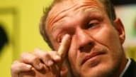Le skieur autrichien de 36 ans a eu dû mal à contenir son émotion au moment d'annoncer la fin de sa carrière sportive.