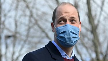 Le prince William réagit après avoir visité une école dans l'est de Londres le 11 mars