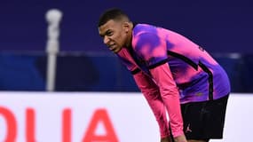 Kylian Mbappé grimaçant lors d'OL-PSG