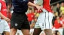Roy Keane et Patrick Vieira au bon vieux temps lorsqu'ils jouaient à Manchester United et Arsenal.