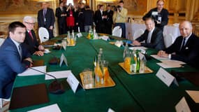 Le ministre des Affaires étrangères Laurent Fabius, et ses homologues russe, ukrainien et allemand, le 24 février, au Quai d'Orsay, à Paris, pour une réunion sur l'Ukraine. 