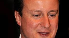 Après attribution de 615 des 650 sièges, il apparaît que les Tories de David Cameron ne pourront pas disposer d'une majorité absolue en sièges à la Chambre des communes, la chambre basse du parlement britannique. /Photo prise le 7 mai 2010/ REUTERS/Toby M