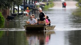 A Reserve, en Louisiane, jeudi. La plus grande partie de la Louisiane était toujours inondée et privée d'électricité vendredi matin, alors que la queue du phénomène Isaac, rétrogradé d'ouragan de catégorie 1 en tempête tropicale, se dirigeait vers le Nord