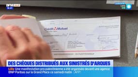 Inondations dans le Pas-de-Calais: des chèques distribués à des sinistrés à Arques