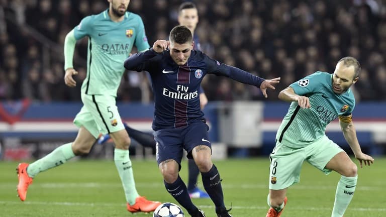 Verratti et Iniesta au duel, lors de PSG-Barça