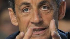Nicolas Sarkozy a demandé mardi "hauteur" et "dignité" aux dirigeants de sa majorité face à l'affaire visant Dominique Strauss-Kahn. /Photo prise le 5 mai 2011/REUTERS/Philippe Wojazer