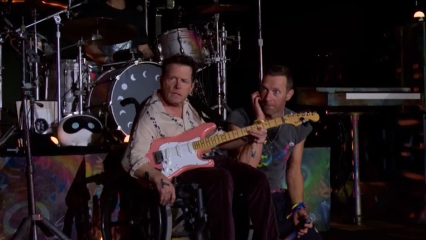 Michael J. Fox shock visitor at Glastonbury Pageant to play guitar with Coldplay