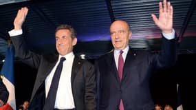 Nicolas Sarkozy et Alain Juppé lors du fameux meeting de Bordeaux, samedi 22 novembre