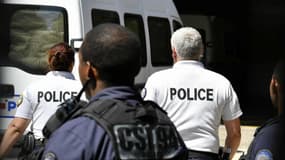 Un camion de la police transportant l'un des accusés arrivant au Tribunal de grande instance de Créteil le vendredi 3 août 2018
