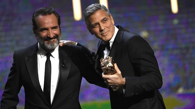 George Clooney et Jean Dujardin ce vendredi lors de la 42ème cérémonie des César.