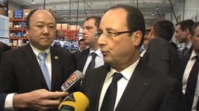 François Hollande à Pékin, dans les ateliers de l'usine Bernard Controls, jeudi 25 avril.