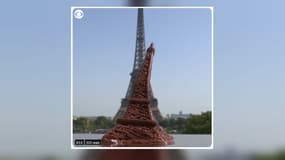 Une tour Eiffel en chocolat devant la vraie, le 25 juillet 2019 à Paris. 