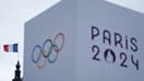 Illustration Jeux olympiques de Paris 2024, les anneaux olympiques et le logo, juillet 2024