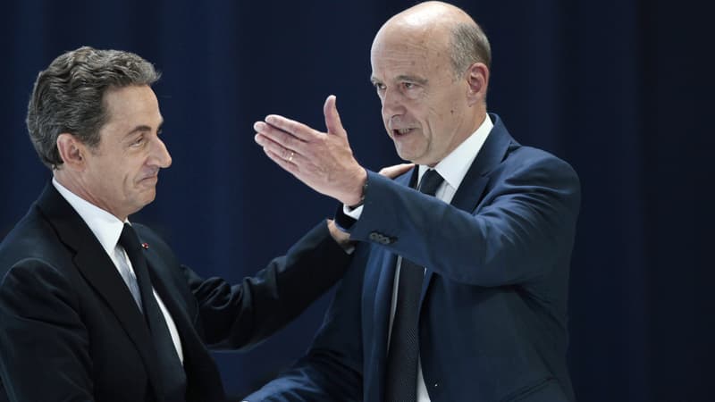 Nicolas Sarkozy et Alain Juppé, samedi, lors du congrès fondateur des Républicains.