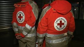 Membres de la Croix rouge. (Illustration)