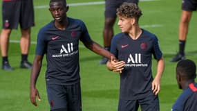 Tanguy Kouassi et Adil Aouchiche.