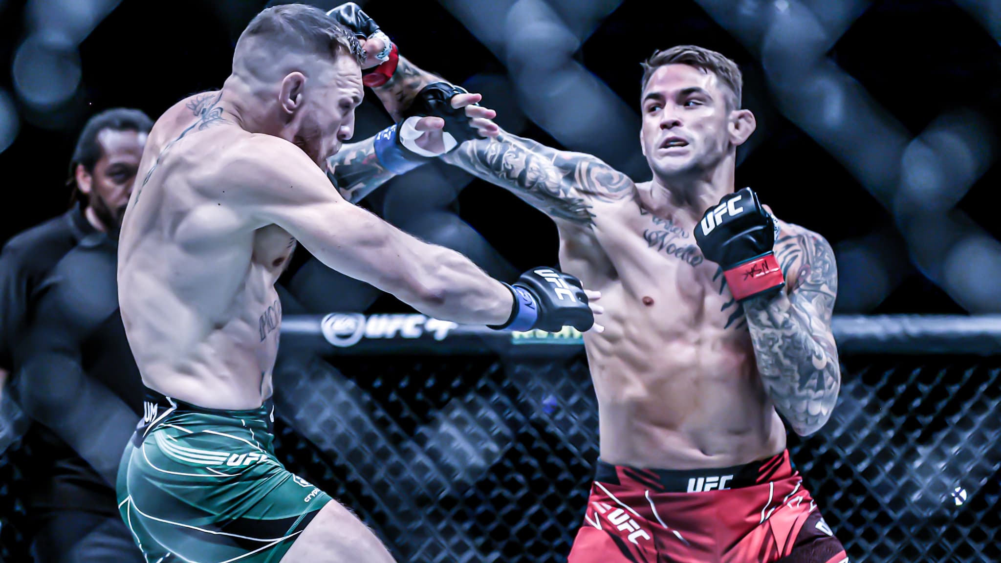 Conor McGregor et Dustin Poirier lors de leur troisième affrontement, en juillet 2021. Conor McGregor et Dustin Poirier lors de leur troisième affrontement, en juillet 2021.