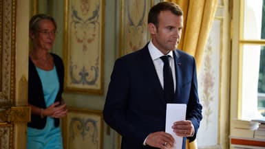 Elisabeth Borne et Emmanuel Macron lors d'une intervention au palais de l'Élysée, le 27 juin 2018.