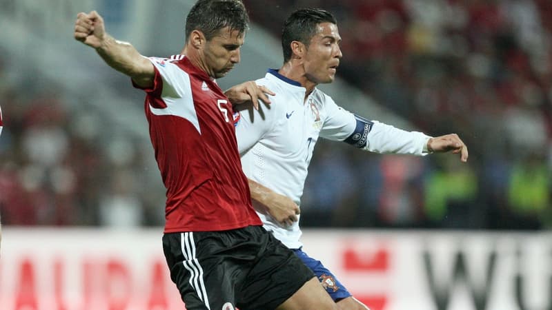 Lorik Cana en duel avec Cristiano Ronaldo