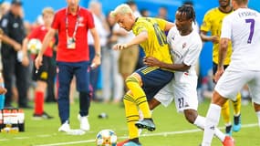 Christian Koffi au duel avec Mesut Özil