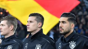 Emre Can  (à droite)