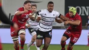 Eneriko Buliruarua (au centre) lors du match Brive-Lyon de Top 14, le 29 février 2020