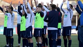 Les joueurs de Bergerac vainqueurs du FC Metz au Stade de Campréal, dans l'une des grosses surprises des 32e de finale de la Coupe de France, le 19 décembre 2021 