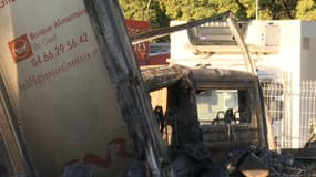 La carcasse d'un des six camions de la Banque alimentaire du Gard incendiés dans la nuit du 27 au 28 novembre 2024 à Nîmes.