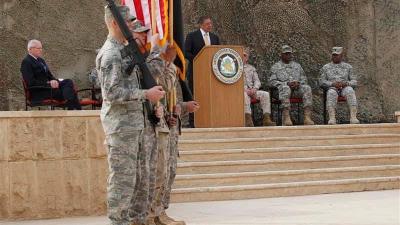 Au pupitre, le secrétaire américain à la Défense a prononcé jeudi le discours marquant officiellement le départ d'Irak des troupes américaines, près de neuf ans après leur intervention, en mars 2003, pour renverser Saddam Hussein. /Photo prise le 15 décem