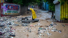 Inondations provoquées par le passage de la tempête Laura en Haïti, sur cette photo dans la ville de Petion-Ville, dimanche 23 août