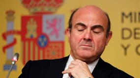 Le ministre de l'Economie espagnol, Luis de Guindos. Les ministres des Finances de la zone euro ont convenu samedi de prêter jusqu'à 100 milliards d'euros à l'Espagne afin de lui permettre de renflouer ses banques en difficulté, Madrid s'engageant à préci